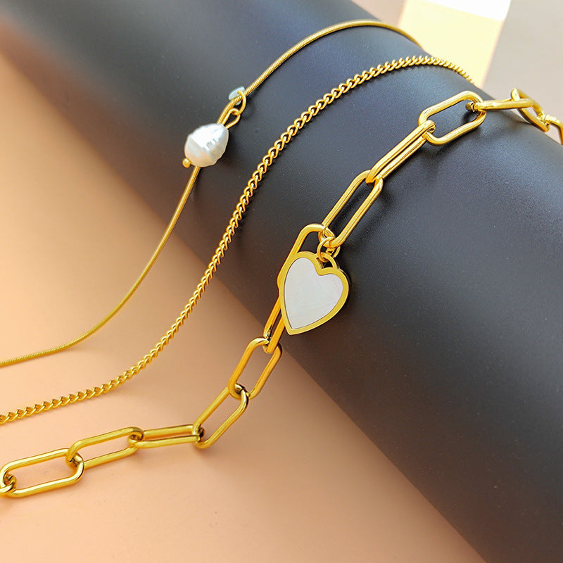 Pearl Heart-shaped Trendy Necklace Popular Titanium Steel Multi-layer Sweater Chain With A Distinctive Elegant Vibe
